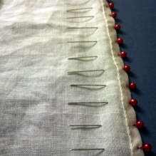 After the base veil was hemmed, I used pins to mark the locations for ruffle attachment.